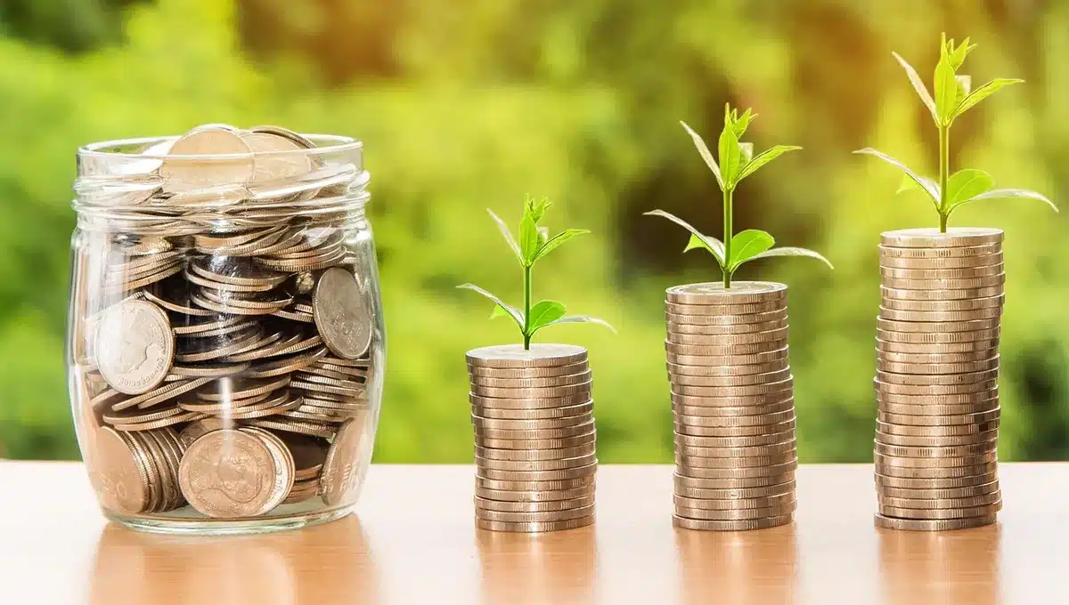 Rappresentazione simbolica di debito e investimenti finanziari con grafici in rosso